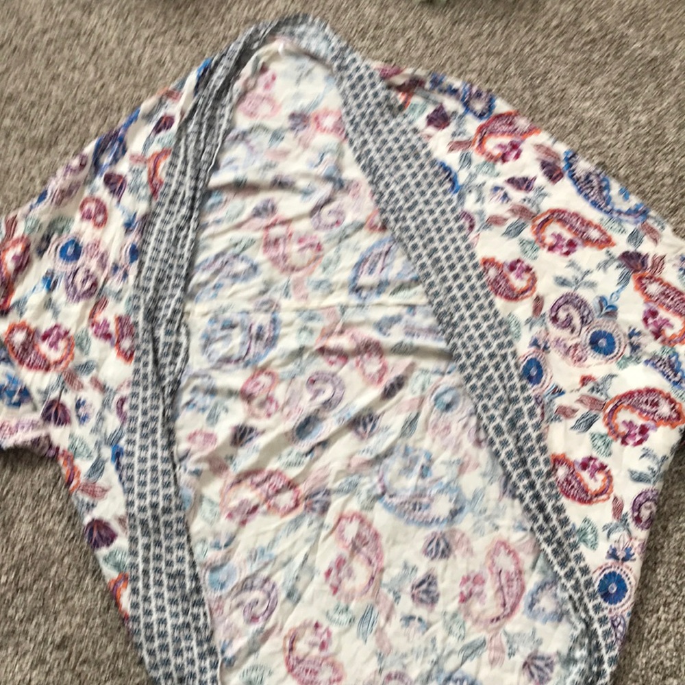 Coverall. Says size medium, could fit many sizes.